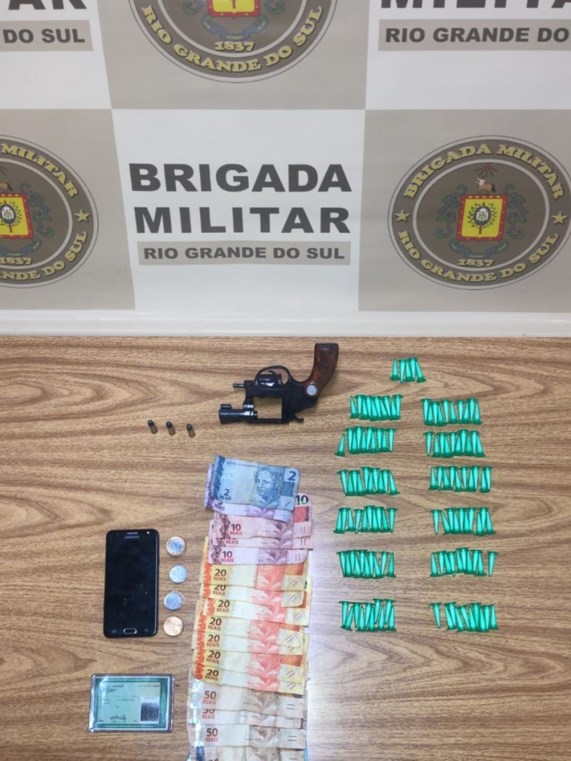 Pris&atilde;o por trafico de entorpecentes e porte ilegal de arma de fogo